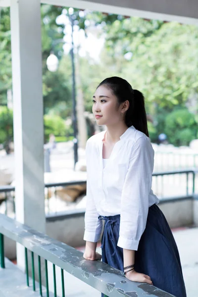 Girl standing outdoors — Stock Photo, Image