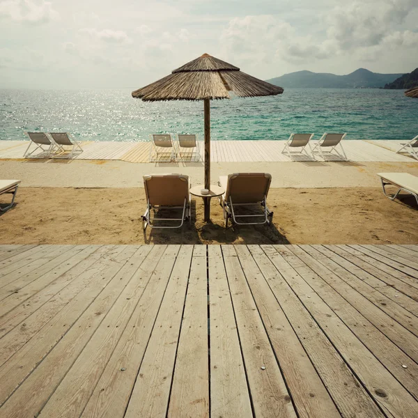 Wooden deck terrace over beach — Stock Photo, Image