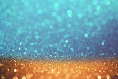 Altın ve mavi glitter bokeh arka plan
