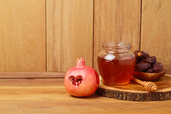 Pomegranate and honey jar — Stock Photo, Image