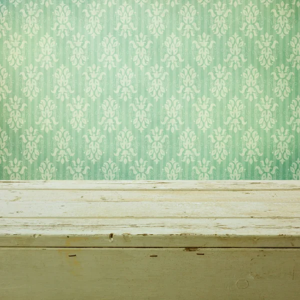 Retro classical wallpaper and wooden table — Stock Photo, Image