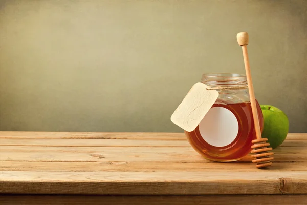 Miel y manzana sobre mesa de madera con espacio para copiar —  Fotos de Stock