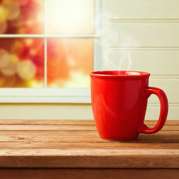 Red cup over window — Stock Photo, Image