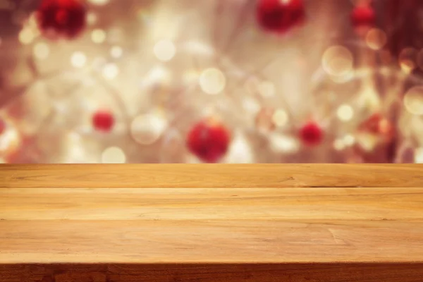 Table over Christmas bokeh background — Stock Photo, Image