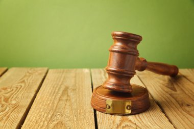 Judge gavel on wooden background