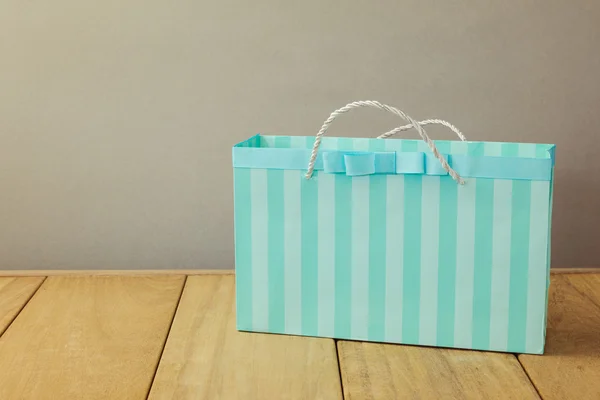 Shopping bag on table — Stock Photo, Image