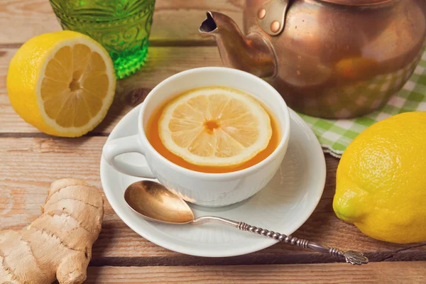 Tea cup with ginger and lemon — Stock Photo, Image