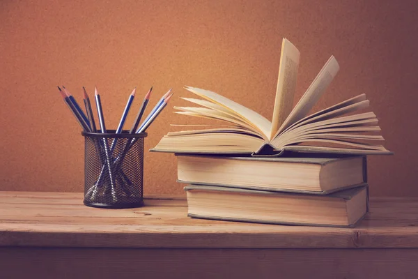 Open book and pencils — Stock Photo, Image