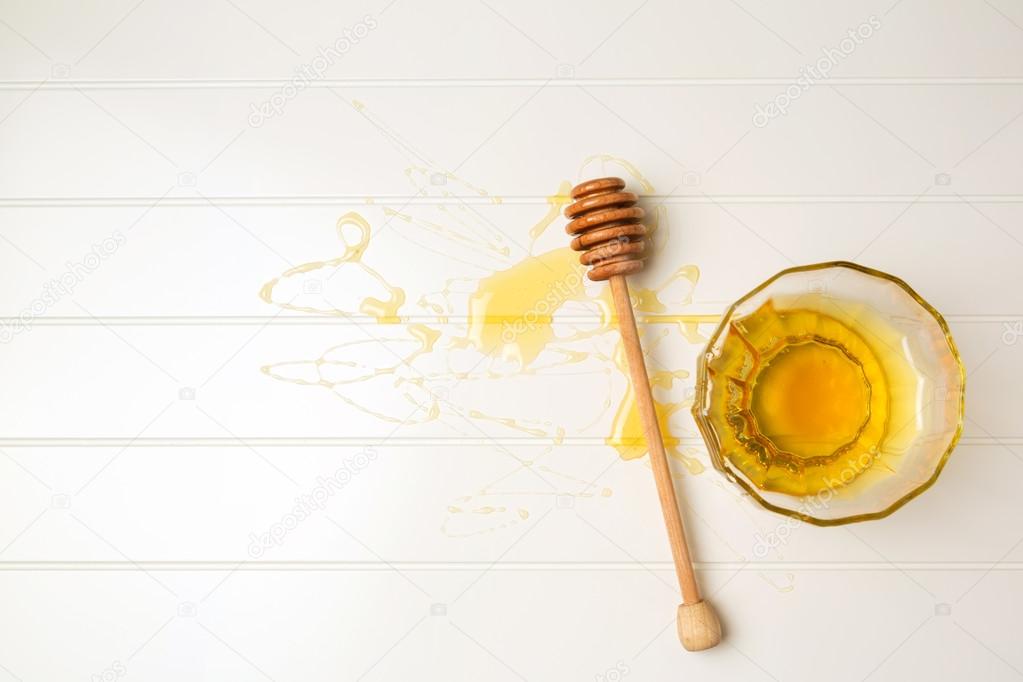 Honey on white table