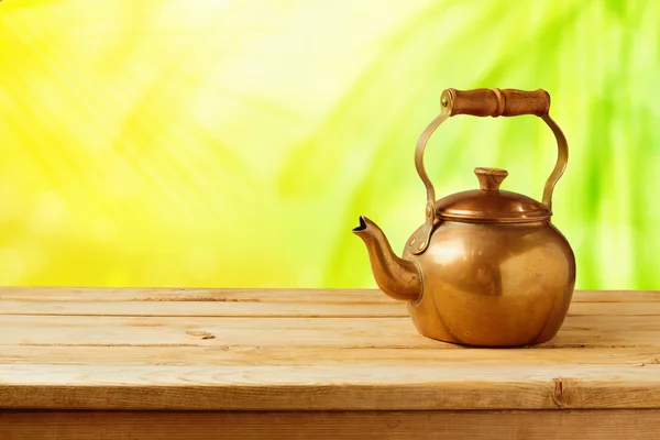 Vintage tea pot on table — Stock Photo, Image