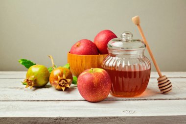 Honey jar and apples with pomegranate clipart