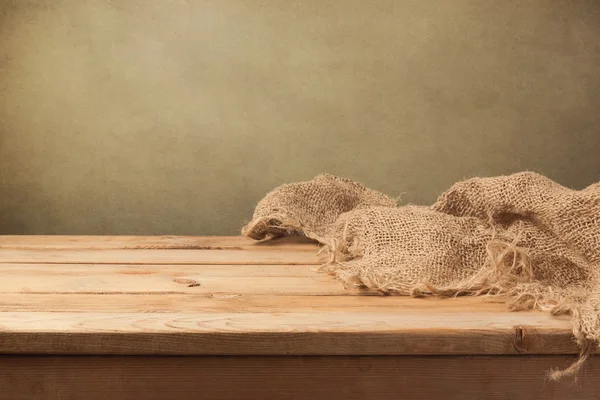 Mesa de madera y saco — Foto de Stock