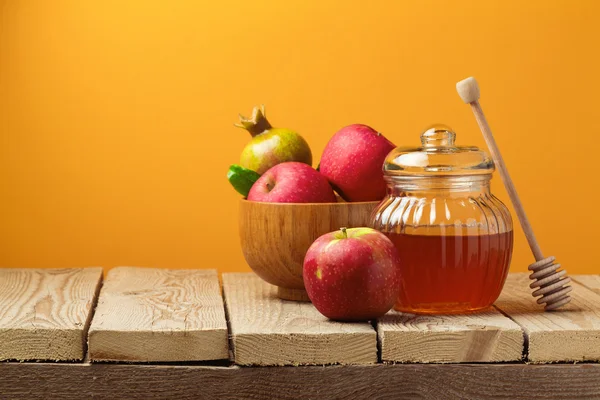 Honey jar and apples — Stock Photo, Image