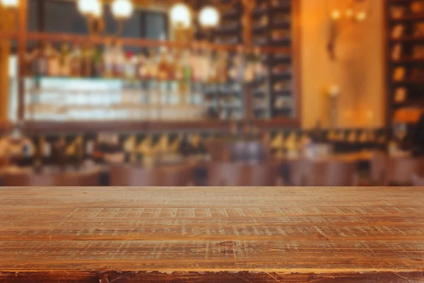 Bar interior with wooden table — Stock Photo, Image