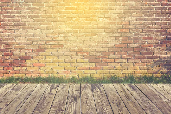 Wooden deck floor and brick wall — Stock Photo, Image