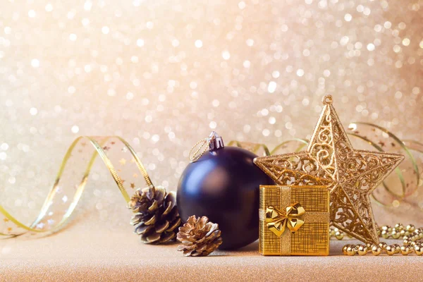 Christmas decorations in black and gold — Stock Photo, Image