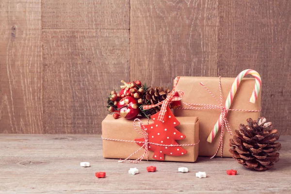 Gift boxes and rustic decorations — Stock Photo, Image