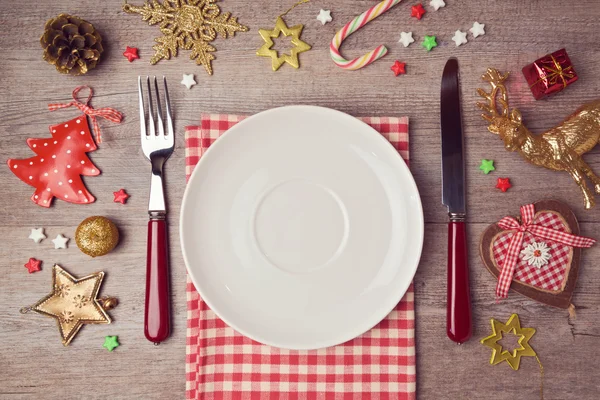 Vánoční večeře pozadí s rustikální výzdobou — Stock fotografie