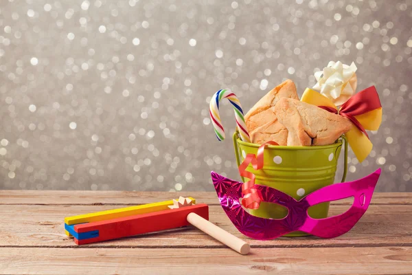 Galletas de hamantaschen y ruidoso grogger — Foto de Stock