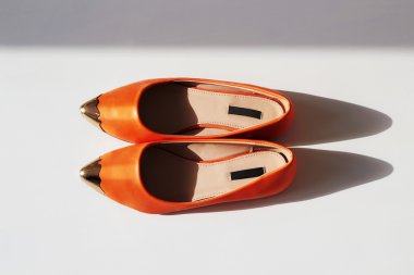 female summer shoe.orange girls shoes without heels clipart
