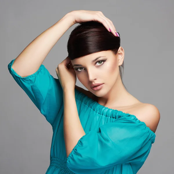 Fashion Beauty Portrait.healthy Hair. Beautiful Girl in blue dress.young Woman Stock Picture