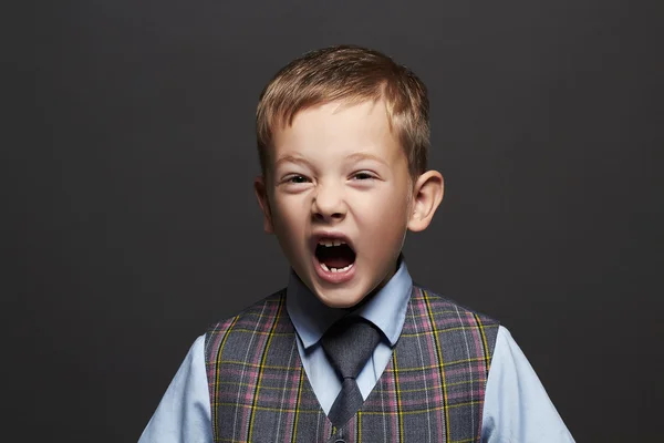 Kids emotion.fashionable little boy.stylish funny child in suit and tie — Stock Photo, Image