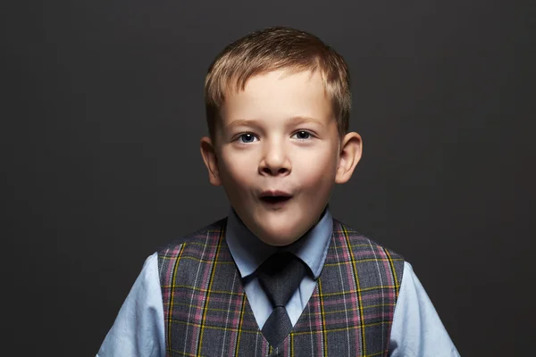 Kids emotion.fashionable little boy.stylish funny child in suit and tie — Stock Photo, Image