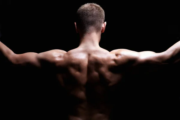 男人回来了裸体肌肉男人 体育健身概念 图库照片