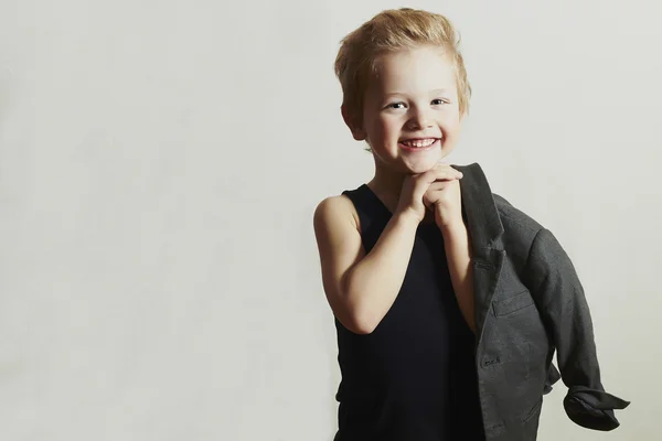 小さな boy.stylish ヘアカットの笑みを浮かべてください。ファッション children.funny 子 — ストック写真