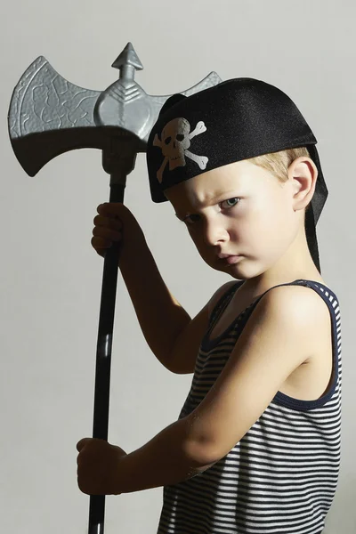 Little barbarian.Boy in Carnival Costume.Angry warrior.Masquerade.Unusual Uniform.Pirate Child.Halloween — Stock Photo, Image
