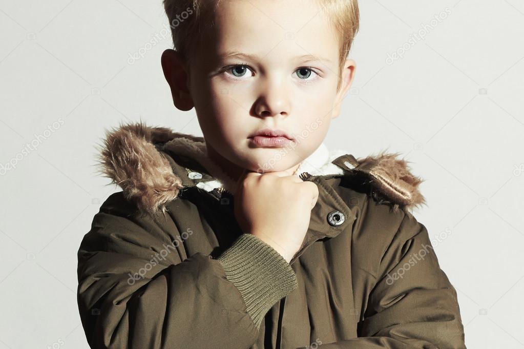 Fashionable child in winter coat.fashion kids.children.khaki parka.little boy
