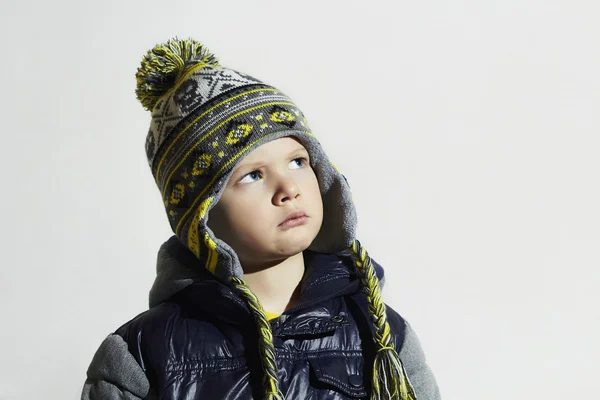 Serious child.winter fashion kids.fashionable little boy in cap — Stock Photo, Image