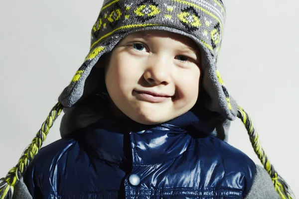 Funny child.fashion kids.smiling fashionable little boy in winter color cap — Stock Photo, Image