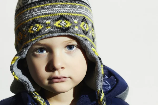 Child with blue eyes.fashion kids.fashionable little boy in winter cap — Stock Photo, Image