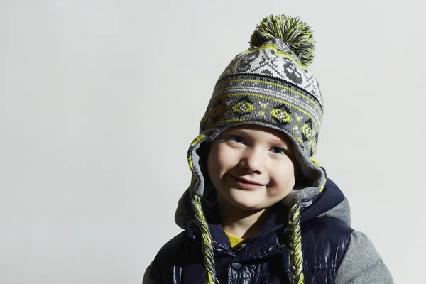 Funny child.winter fashion kids.smiling fashionable little boy in cap — Stock Photo, Image