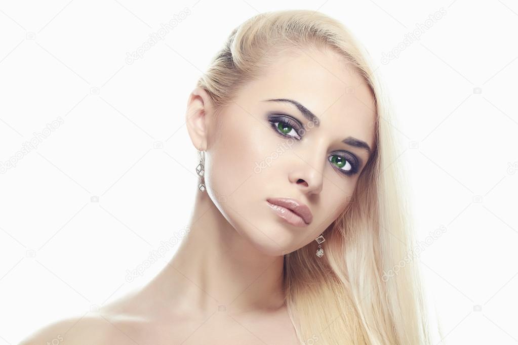 Beauty Girl over white background.Hairstyle and Make-up. Sexy young Woman