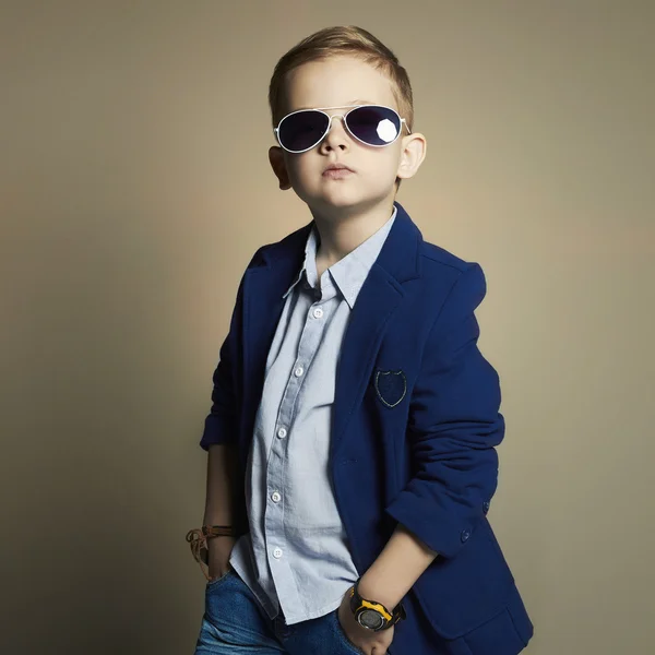 Fashionable little boy in sunglasses.stylish kid in suit. — Stock Photo, Image