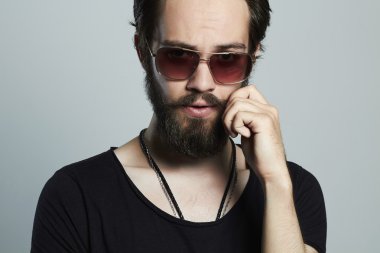 handsome man. Brutal bearded Sexy boy in trendy sunglasses