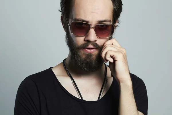 Handsome man. Brutal bearded Sexy boy in trendy sunglasses — Stock Photo, Image