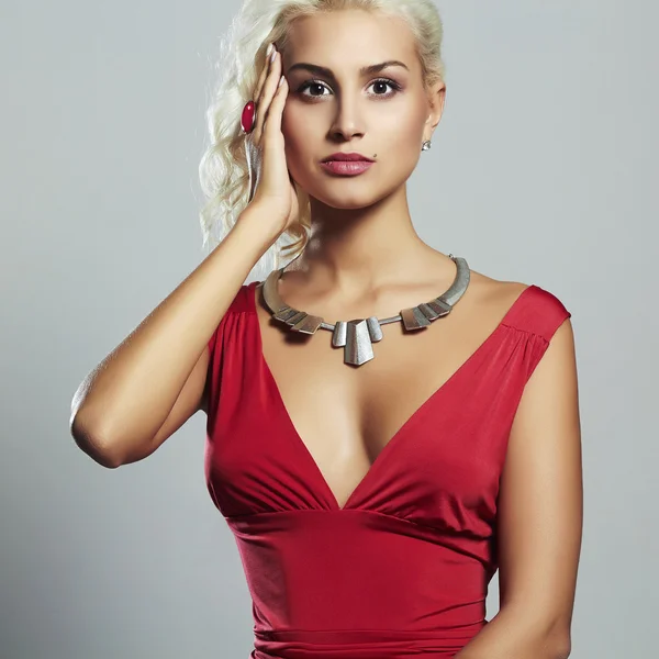 Young beautiful woman.Sexy body Blond girl.red dress — Stock Photo, Image