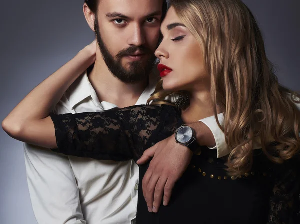 Fashionable couple in tender passion. Beautiful woman near handsome man — Stock Photo, Image