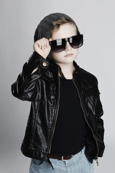 Funny child.fashionable little boy in sunglasses — Stock Photo, Image