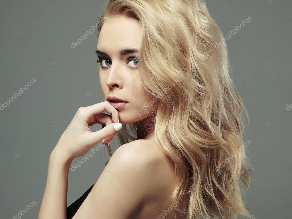 Young beautiful  Blond  Stock Photo by  ©EugenePartyzan 93478740
