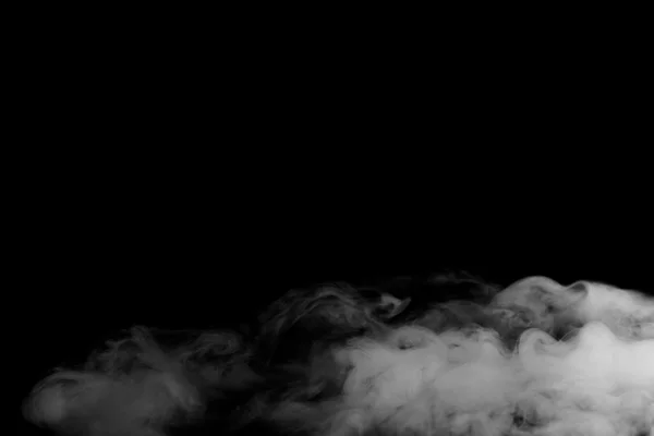Abstraktní mlha nebo kouř přesunout na pozadí černé barvy — Stock fotografie