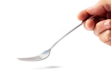 Metalik boş yemek çatalı beyaz arka planda izole edilmiş bir insan sağ elinde.
