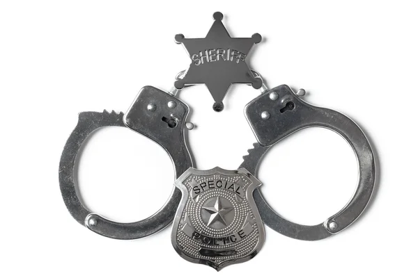 Αστέρι σερίφηδων σήμα αστυνομία και χειροπέδες - φωτογραφία απόθεμα — Φωτογραφία Αρχείου