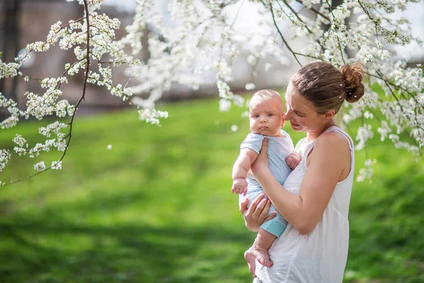 Baby boy playing with his mother — Stock Photo, Image