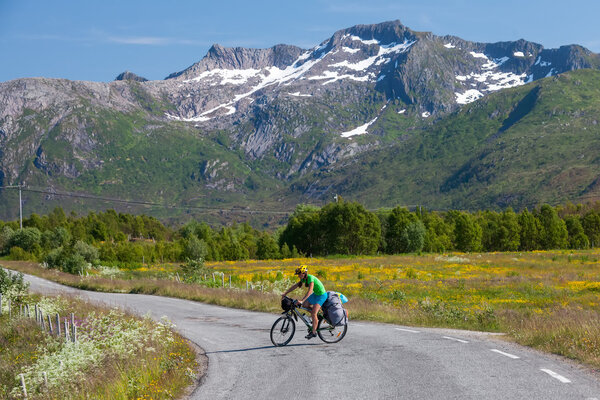 Biking in Norway against picturesque landscape