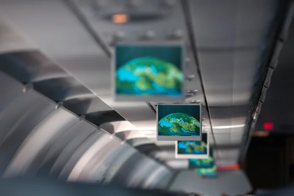 Information display inside passenger airplane — Stock Photo, Image