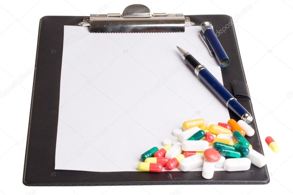 Pills and notepad